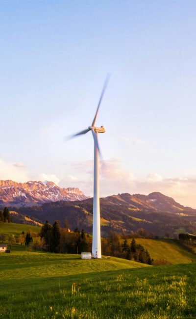windmill on a grassy knoll