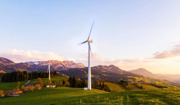 windmill on a grassy knoll