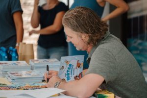 rich razgaitis signing childrens book